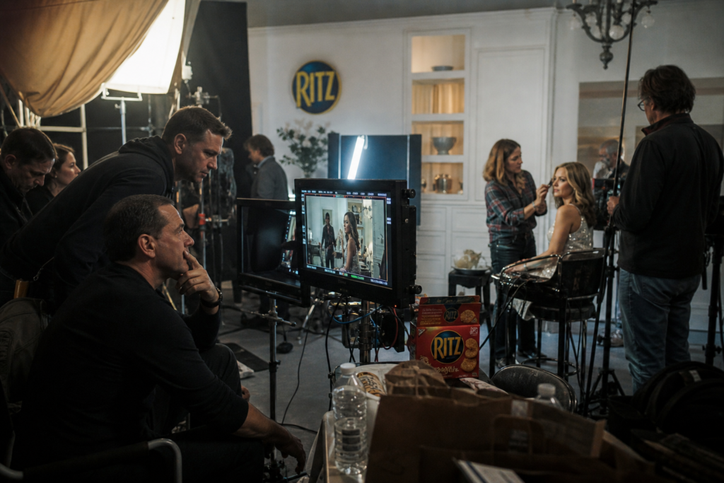 SHADOW PR agency Super Bowl commercial production set for e.l.f. Cosmetics showing creative team and celebrity talent on location